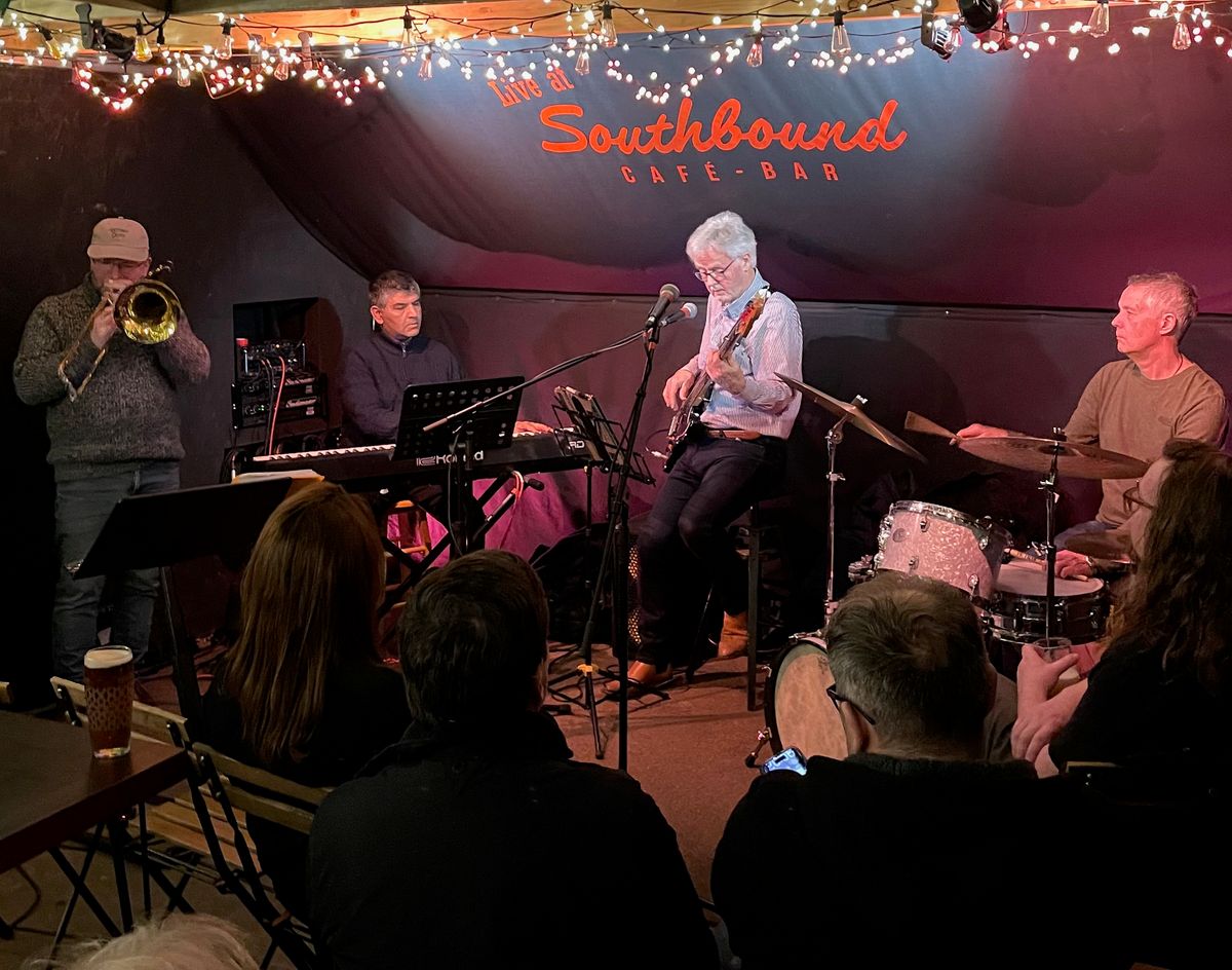 Image of the Southbound stage with a mircophone in the foreground.